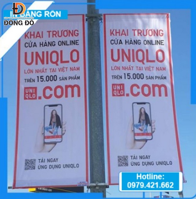 Mẫu băng rôn thông khai trương cửa hàng online Uniqlo treo dọc