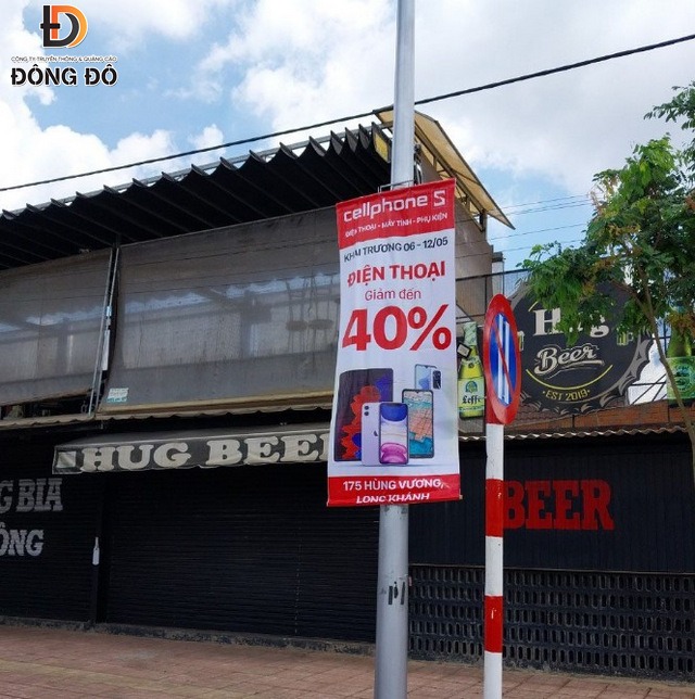 Mẫu treo băng rôn dọc quảng cáo khai trương đúng quy định